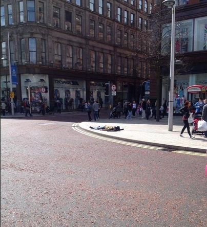 Yes, that is the centre of Belfast. Yes, that man is topless (@MeabhMcN)